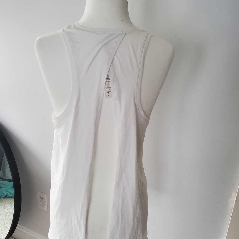 White tank open back lululemon size 6 wore 1 time